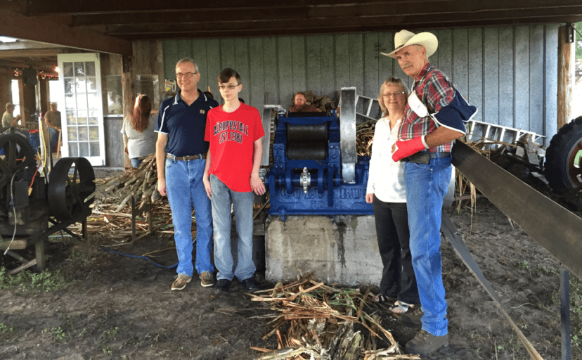 The Petter family with Steve Melton and the Columbus No. 90 Sugar Cane Mill that was restored.
