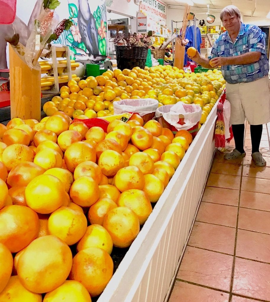 Jim Oleson of Boyett's Grove in Spring Lake will help you pick the finest fruit in his store.
