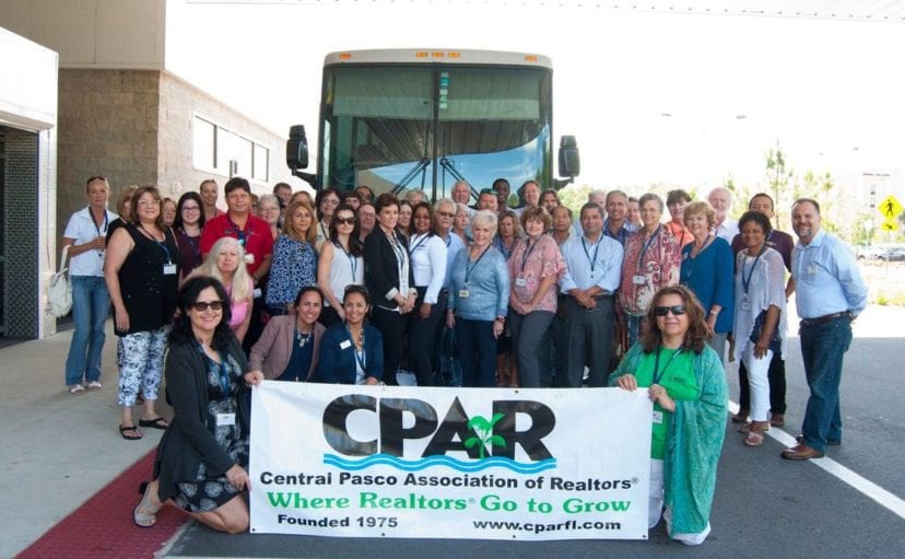 Our Tour de Change group and our charter bus outside of Florida Hospital's Center Ice complex.