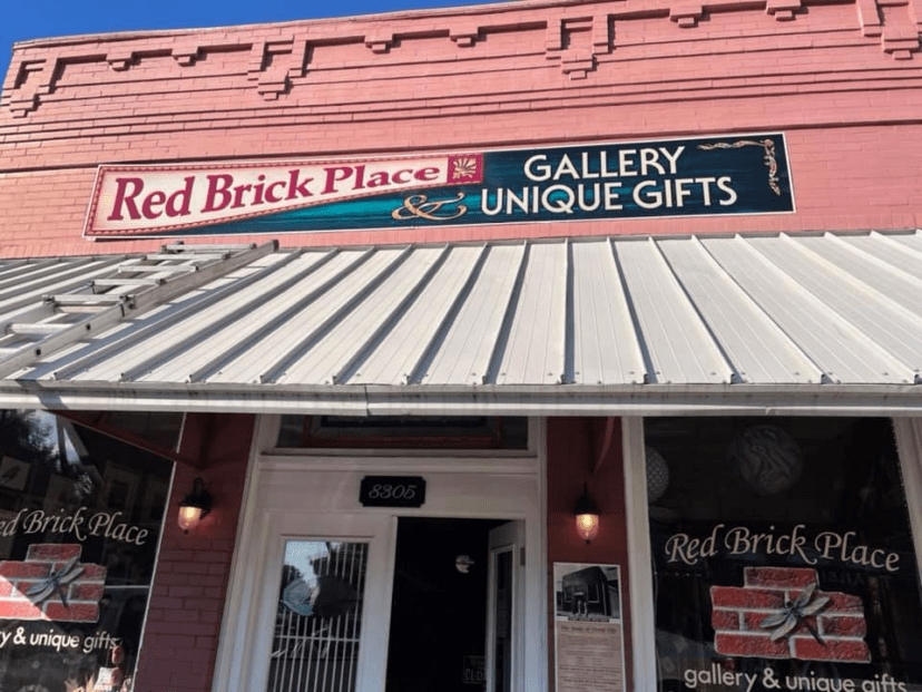 the red brick place sign